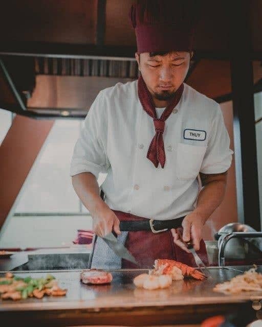 Tanaka of Tokyo Chef cooking lobster tails